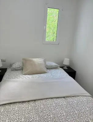 Cama o camas de una habitación en Acogedor apartamento centro de Madrid