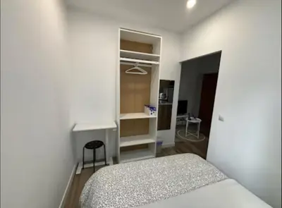 Cama o camas de una habitación en Acogedor apartamento centro de Madrid