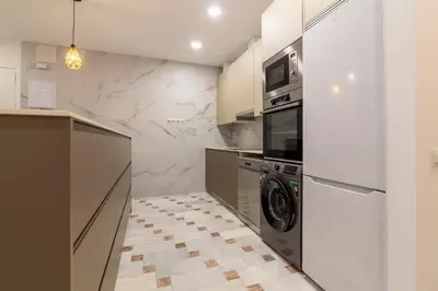 Una cocina o zona de cocina en Para amantes del arte y la cultura