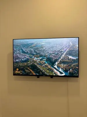 Una televisión o centro de entretenimiento en Renovated apartment 15 minutes from Sol