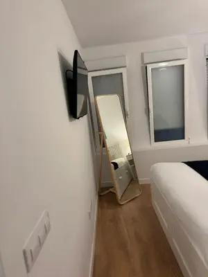Cama o camas de una habitación en Apartamento para 3 personas cerca de Tirso Molina