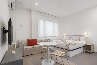 Cama o camas de una habitación en Confort y Ubicación en Madrid - Santero Suites