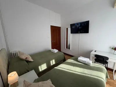 Una televisión o centro de entretenimiento en Habitaciones en Don Ramon