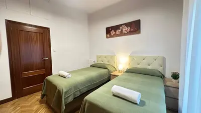 Cama o camas de una habitación en Habitaciones en Don Ramon