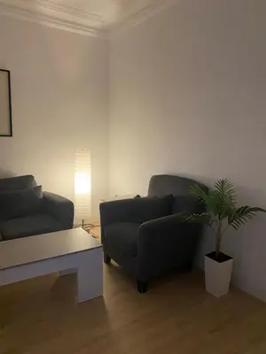 Zona de estar de Private Rooms Madrid El Retiro