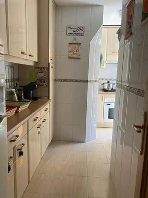 Una cocina o zona de cocina en Private Rooms Madrid El Retiro