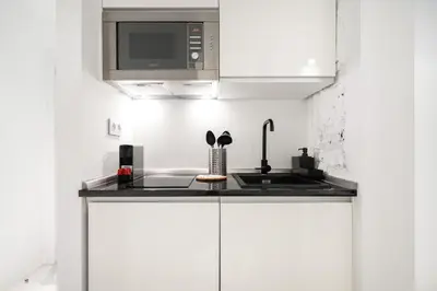 Una cocina o zona de cocina en Dobo Madrid Luna