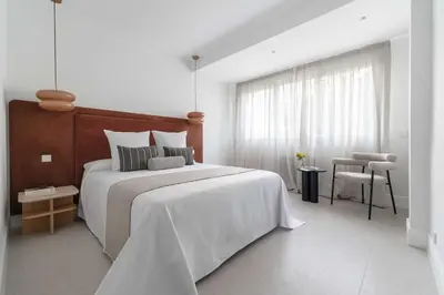 Cama o camas de una habitación en Moderno y acogedor apartamento en Chamberí