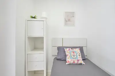 Cama o camas de una habitación en Apartamento Madrid centro Atocha