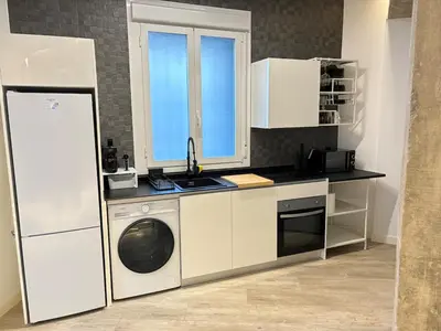 Una cocina o zona de cocina en Cozy apartment in Quince de Mayo by beBalmy