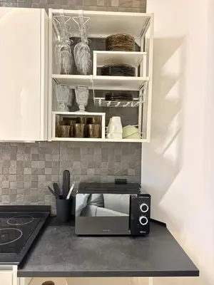 Una cocina o zona de cocina en Cozy apartment in Quince de Mayo by beBalmy