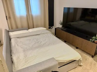 Cama o camas de una habitación en Cozy apartment in Quince de Mayo by beBalmy