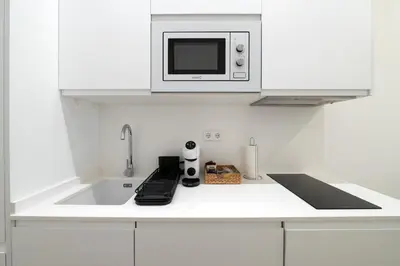 Una cocina o zona de cocina en Magnífico apartamento en pleno centro de Madrid,