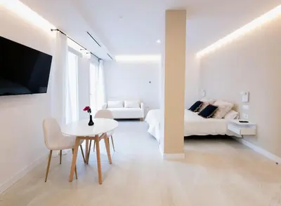 Cama o camas de una habitación en Genial estudio en Madrid castizo