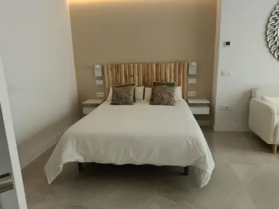 Cama o camas de una habitación en Genial lugar en Madrid castizo