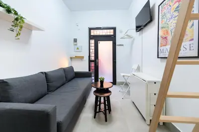 Una televisión o centro de entretenimiento en PAS9 Acogedor dúplex en Puente de Vallecas