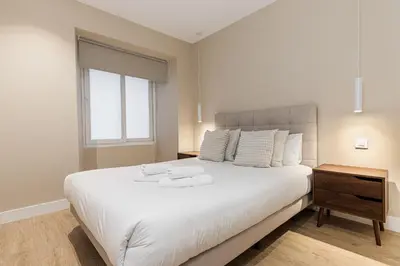 Cama o camas de una habitación en Waou Essence VI Antón Martín - Corta Duración