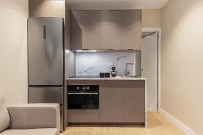 Una cocina o zona de cocina en Waou Essence VI Antón Martín - Corta Duración