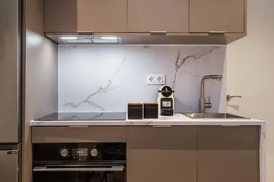 Una cocina o zona de cocina en Waou Essence VI Antón Martín - Corta Duración