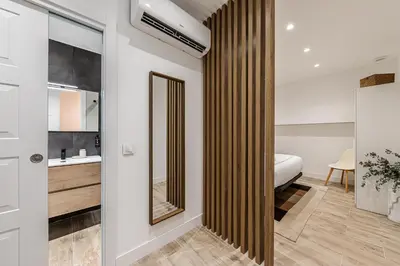 Cama o camas de una habitación en Waou Chamberi VIII - Alquiler Corta Duración