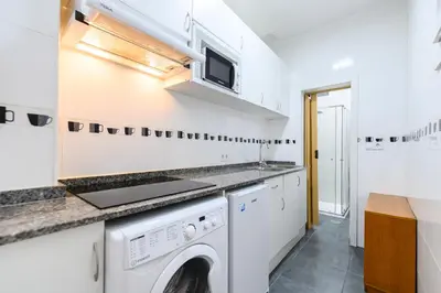 Una cocina o zona de cocina en ESA80E Piso en el centro de Madrid -Malasaña Alquiler temporal