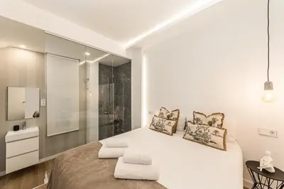 Cama o camas de una habitación en Queen's Salamanca Boutique I - Alojamiento corta estancia