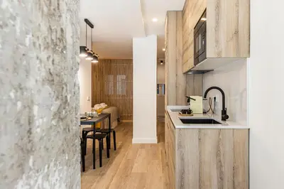 Una cocina o zona de cocina en Queen's Salamanca Boutique I - Alojamiento corta estancia