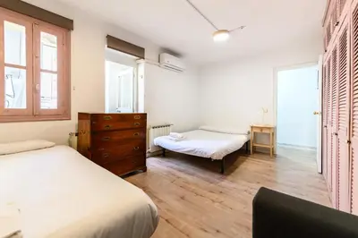 Cama o camas de una habitación en POR183D Amplio piso 2 dormitorios en La Latina - Alquiler temporal