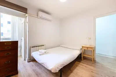Cama o camas de una habitación en POR183D Amplio piso 2 dormitorios en La Latina - Alquiler temporal