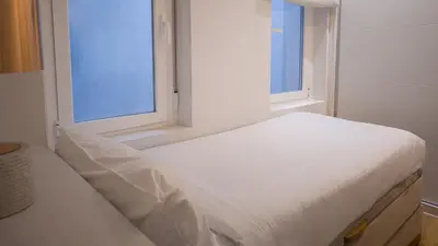 Cama o camas de una habitación en Pza Sto Domingo Apartments 2BD - 102