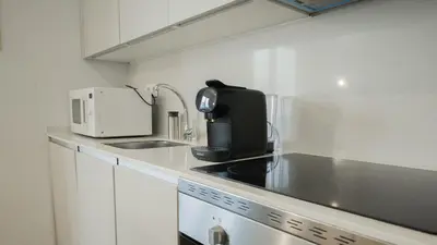 Una cocina o zona de cocina en Pza Sto Domingo Apartments 2BD - 102