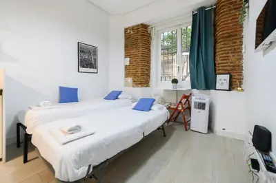 Cama o camas de una habitación en PIZ401 Acogedor Estudio en el Centro de Madrid - Alquiler temporal