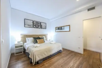 Cama o camas de una habitación en Agora Boutique Coliving Madrid