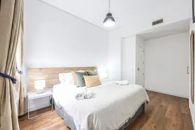 Cama o camas de una habitación en Agora Boutique Coliving Madrid