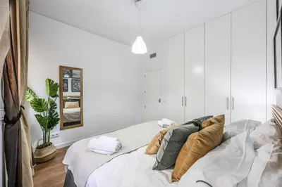 Cama o camas de una habitación en Agora Boutique Coliving Madrid