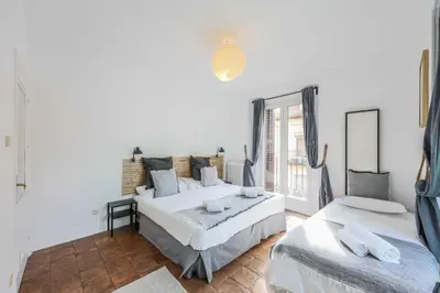 Cama o camas de una habitación en Agora Boutique Coliving Madrid