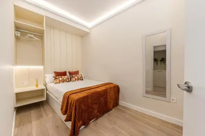 Cama o camas de una habitación en Queen's Chueca Boutique IV - Alojamiento corta estancia