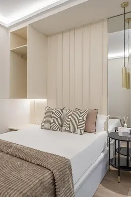 Cama o camas de una habitación en Queen's Chueca Boutique IV - Alojamiento corta estancia