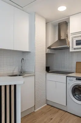 Una cocina o zona de cocina en Queen's Serrano Boutique I - Alojamiento corta estancia