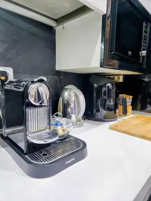 Una cocina o zona de cocina en VERSACE 6PACK -SMART HOME-air conditioner - HISTORIC CENTER-GRAN VIA-SOL-MALASANA
