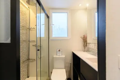 Un baño de TES314E Acogedor Estudio en Centro de Madrid - Alquiler temporal