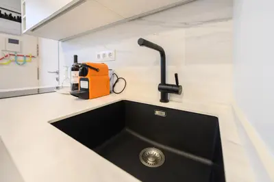 Una cocina o zona de cocina en TES314E Acogedor Estudio en Centro de Madrid - Alquiler temporal