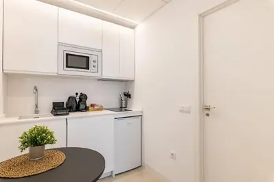 Una cocina o zona de cocina en Exquisito estudio en el centro