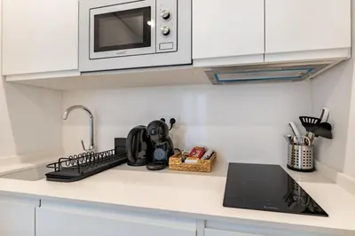 Una cocina o zona de cocina en Exquisito estudio en el centro