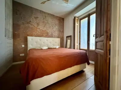 Cama o camas de una habitación en Encantador Apartamento Malasaña Non tourist use