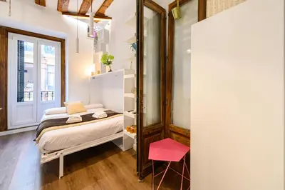 Cama o camas de una habitación en HOR42DA Estudio moderno en el centro de Madrid - Alquiler temporal