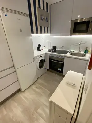 Una cocina o zona de cocina en Lavapiés Center · Modern Apartment for Two