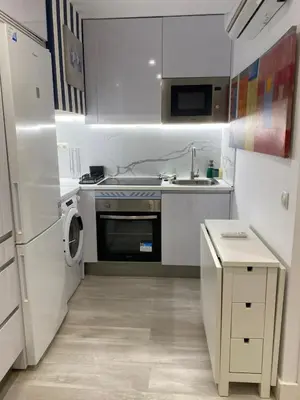 Una cocina o zona de cocina en Lavapiés Center · Modern Apartment for Two