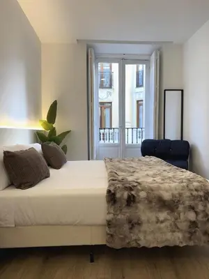 Cama o camas de una habitación en Calle de la Cruz habitaciones