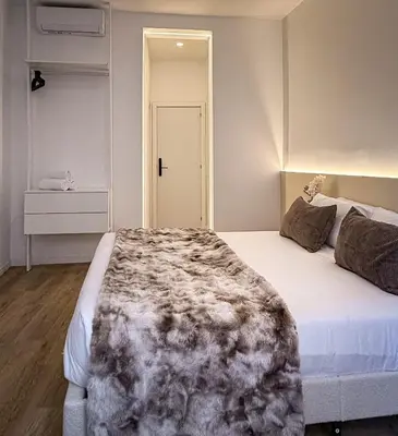 Cama o camas de una habitación en Calle de la Cruz habitaciones